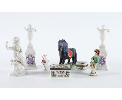 A GROUP OF GERMAN PORCELAIN19th and 20th century Comprising; a Meissen figure of Cupid in disguise, 19th century; a small Mei