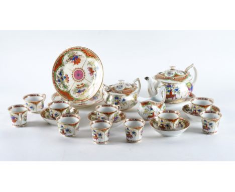 A CHAMBERLAIN'S WORCESTER PART TEA AND COFFEE SERVICECirca 1815 Painted with the `Dragon in Compartments' pattern, comprising