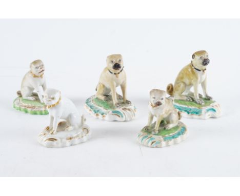 FIVE DERBY PORCELAIN FIGURES OF PUG DOGS (5)Circa 1800-1830 In two sizes, each seated on a scroll moulded mound base, one dog