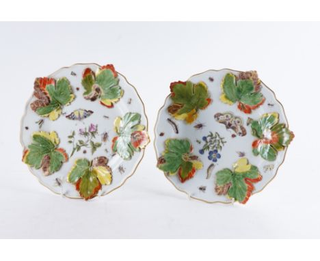A PAIR OF MEISSEN PORCELAIN PLATES (2)Mid 18th century Modelled by J.J. Kaendler, each painted with scattered insects and flo