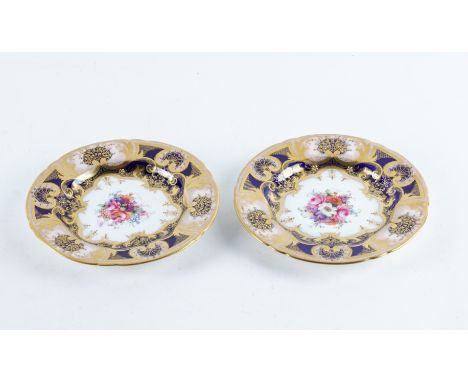 A PAIR OF SMALL ROYAL WORCESTER SIDE PLATESCirca 1932 Each painted with a central bouquet of flowers, signed E.Barker, inside