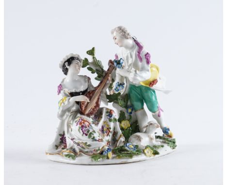 A MEISSEN PORCELAIN PASTORAL GROUPCirca 1745-50 Modelled by J.J.Kaendler, as a young woman seated playing the lute, a gallant