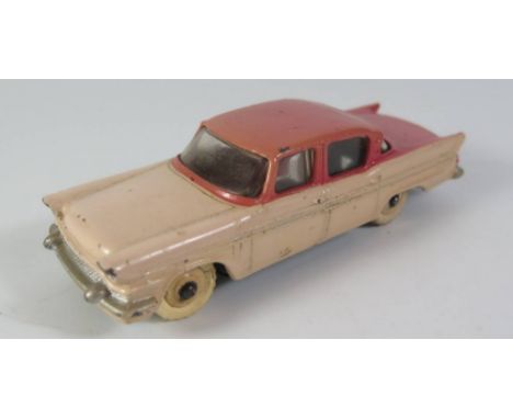 Dinky 180 Packard Clipper Sedan in cerise with cream lower and hubs