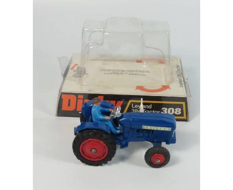 Dinky 308 LEYLAND 384 Tractor in dark blue with red hubs (factory error), boxed