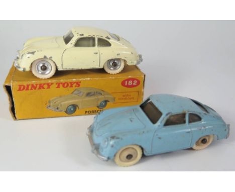 2 Dinky 182 Porshe 356a Coupe Cars _ one in pale blue with cream hubs, boxed the other cream with spun tyres