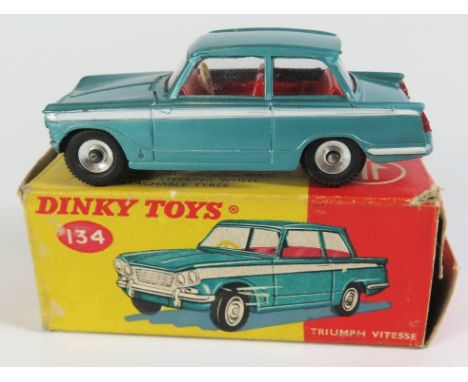 Dinky 134 Triumph Vitesse in metallic aqua blue, no side stripe, white interior and spun wheels, boxed