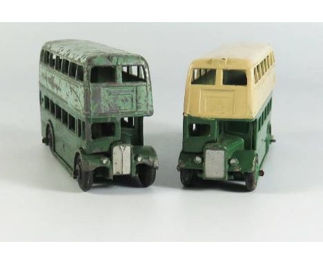Two Dinky 29c Double Decker Buses 1st Type Grill but ridged hubs _ one dark green with light blue roof and the other type 3 i