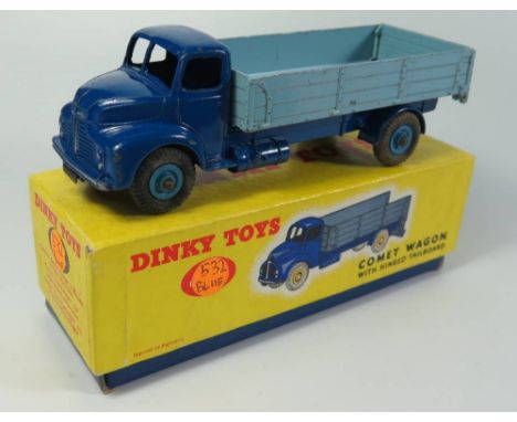 Dinky 532 Leyland Comet Lorry with Hinged Tailboard in dark blue with light blue back and unusual blue grooved hubs, boxed