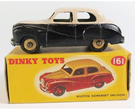 Dinky 40j / 161 Austin (A40) Somerset in white upper and hubs with black lower and hubs, type two boxed