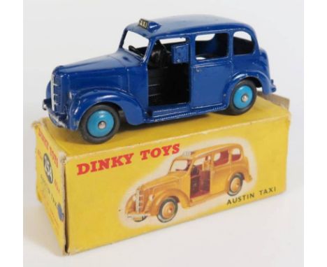 Dinky 40h / 254 Austin FX3 Taxi in dark blue with light blue hubs, type 1 boxed