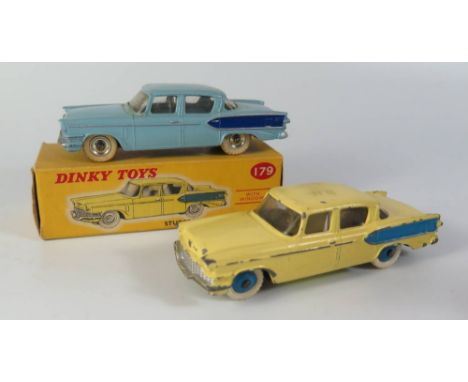 Two Dinky 179 Studebaker President Cars _ one in yellow with blue flash and hubs, boxed the other light blue with dark blue f