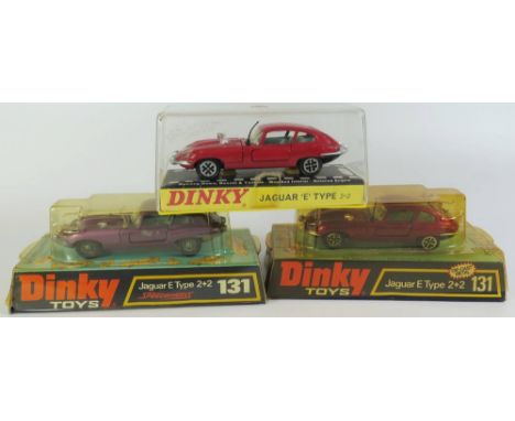 Three Dinky 131 Jaguar 'E' Type Cars _ metallic purple, metallic red and post office red, all boxed