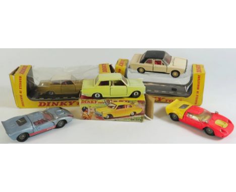 Two Dinky 132 Ford 40 RV (unboxed) and Three Dinky 133 Ford Cortina one in type one box and one in type two and spare type on