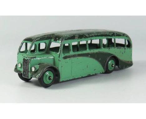 Dinky 29e Single Deck Bus in light green, light green hubs with unusual dark green roof and flashes