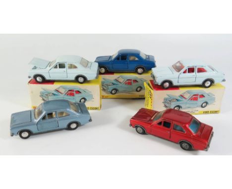 Five Dinky 168 Ford Escorts _ two pale blue boxed and one metallic blue boxed, light metallic blue and metallic red
