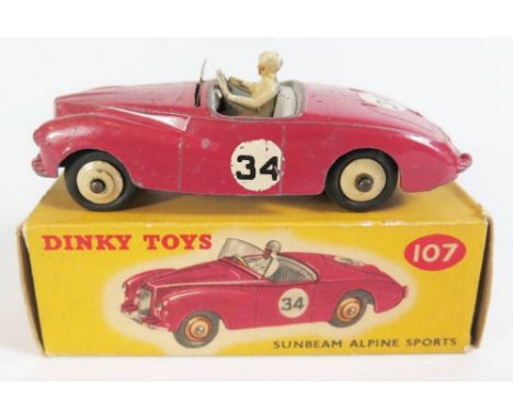 Dinky 107 Sunbeam Alpine Sports in deep pink with grey interior and cream hubs no. 34, boxed