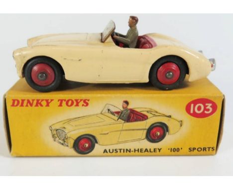 Dinky 103 Austin Healey 100 in cream with grey driver, red interior and hubs, boxed