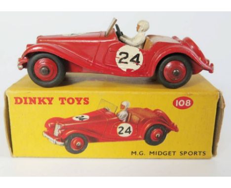 Dinky 108 MG Midget in red with tan interior and red hubs, no. 24, boxed
