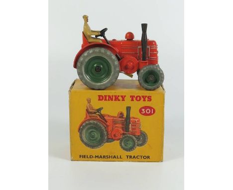 Dinky 301 FIELD-MARSHALL Tractor in orange with green cast wheels, boxed