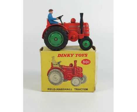 Dinky 301 FIELD-MARSHALL Tractor in orange with green cast hubs to the back and plastic front, boxed