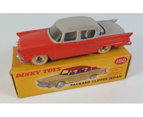 Dinky 180 Packard Clipper Sedan in orange with grey upper and spun wheels, boxed