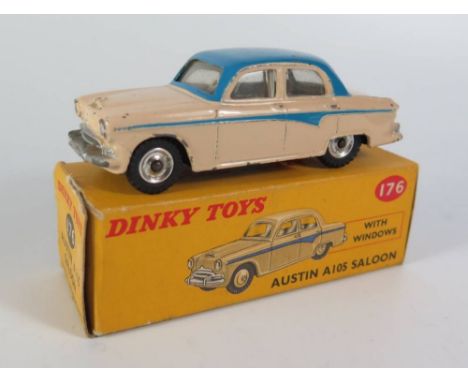 Dinky 176 Austin 105 Saloon in cream with mid blue strip and roof, spun wheels and boxed