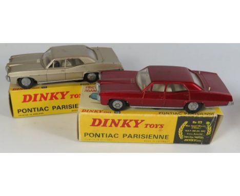 Two Dinky 173 Pontiac Parisienne Cars _ one maroon replacement boxed the other metallic beige? and white interior boxed
