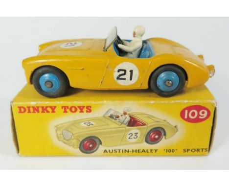Dinky 109 Austin Healey 100 in yellow with blue interior and hubs no.21, boxed