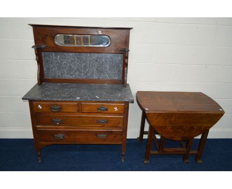 AN EDWARDIAN MAHOGANY WASHSTAND with a marble and mirrored splash back and four drawers, width 107cm x depth 46cm x height wi