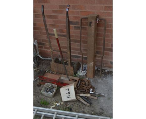 A VINTAGE IRON SACK TRUCK, square section post hammer, a 11/2 ton trolley jack, a tray of sockets, an iron chain and a small 