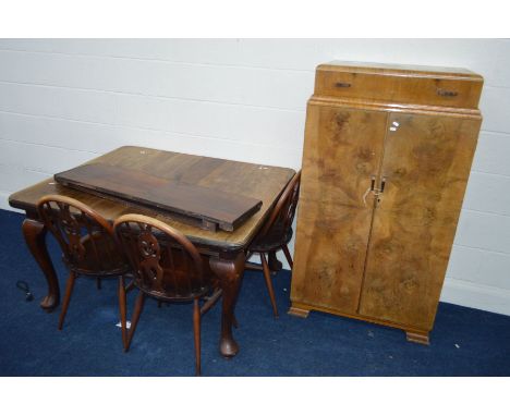 A LATE VICTORIAN MAHOGANY WIND OUT DINING TABLE, with two additional leaves, three Ercol chairs and an Art Deco walnut tall b