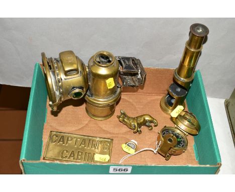 BRASS METALWARES, comprising Lucas Oalcia Cadet bicycle lamp, field microscope, two compasses, Corgi Dog and door plaque mark