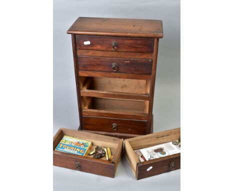 A FIVE DRAWER CABINET, 24'' X 8'' X 12'' CONTAINING COINS AND CURIOS to include silver coins, five pound coins, pen knives, s