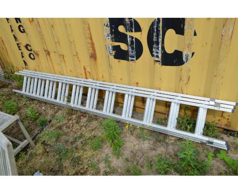 AN ALUMINIUM DOUBLE EXTENSION LADDER all three sectioons are 300cm long with eleven rungs to each