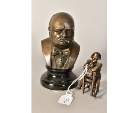 A MODERN BRONZED BUST OF CHURCHILL, on a ceramic base, height 15cm, together with a small cast seated soldier figure, approxi