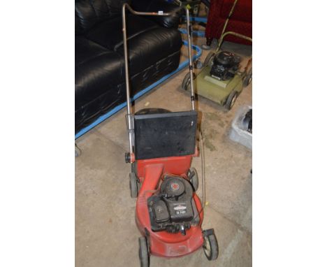 A HARRY PETROL LAWN MOWER powered by a Briggs and Stratton 3hp engine, with grass box