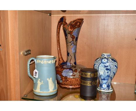 A VICTORIAN TUNSTALL CERAMIC JASPERWARE JUG, height 17cm, together with a Wedgwood black basalt covered cylindrical pot with 