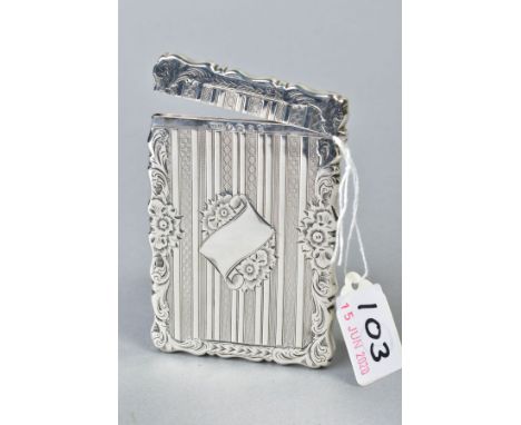 A LATE VICTORIAN SILVER CARD CASE OF WAVY RECTANGULAR OUTLINE, foliate engraved and engine turned with plain vertical bands, 