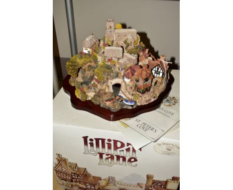 A BOXED LIMITED EDITION LILLIPUT LANE SCULPTURE, 'St Peter's Cove' No 1732, with certificate, leaflet and wooden plinth