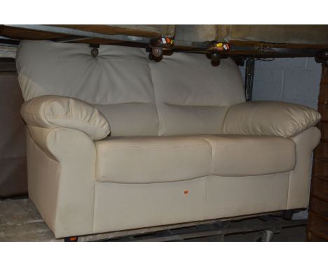 A CREAM LEATHER TWO SEATER SOFA, width 156cmCondition Report   Clean and in nearly new condition