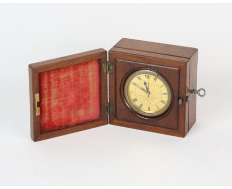 A Phili[ps brothers of London Travel alarm clock in cylindrical case  the dial with Roman numeral hour markers applied to cha