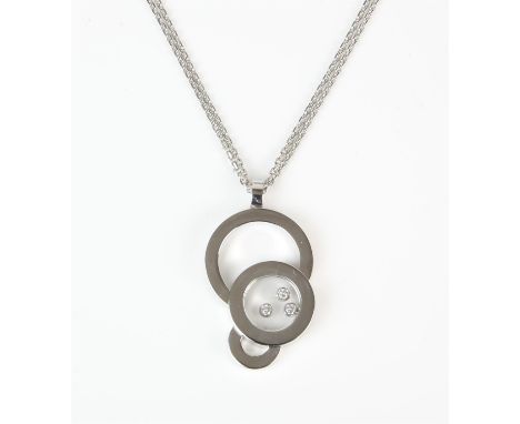 Chopard Happy Diamonds necklace, with three interlocking circles with three collet set diamond free moving between glass in t