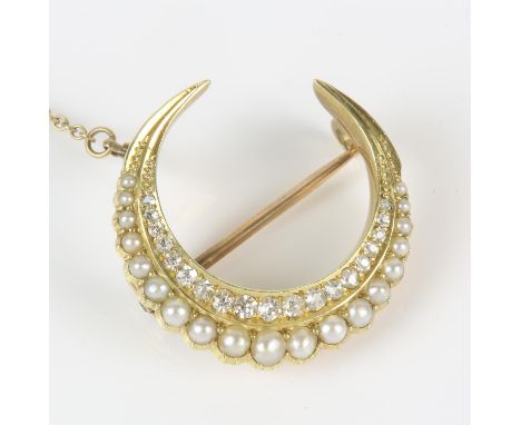 A pearl and diamond crescent brooch, set with a row of single cut diamonds, and a row of pearls, mounted in gold testing as 1