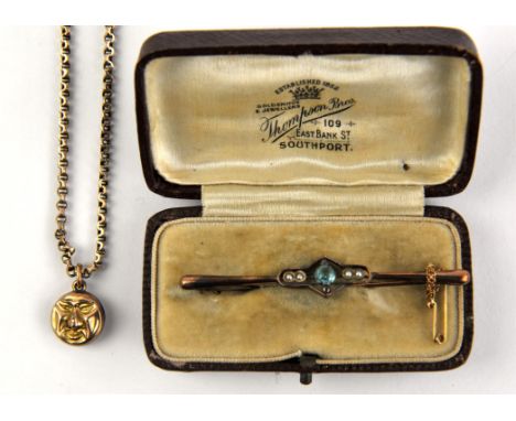 A pendant with a face on both sides, on a fancy belcher chain, together with a blue apatite and pearl bar brooch, both tested