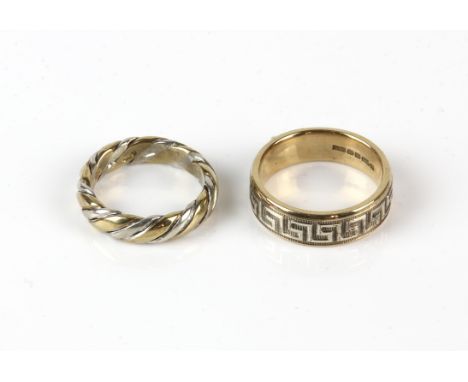 Two bi coloured rings, one a twist motif ring, size K, the other a Greek key motif, size N, both in 9 ctCondition Report:  Gr