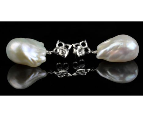 Baroque pearl drop earrings, each set with a baroque pearl approximately measuring 22mm x 17mm, suspended from a quatrefoil m