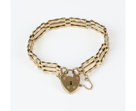 A three row gate bracelet, stamped 9 ct on a heart padlock clasp, hallmarked 9 ct, London 1968, makers mark AJCo, length 18cm