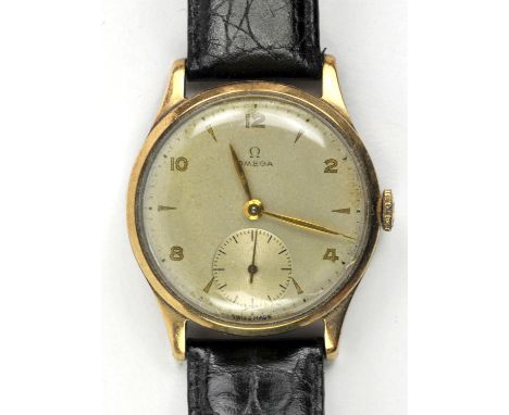 Omega, A gentleman's gold wristwatch, the signed dial with Arabic and dagger hour markers, fitted with a signed 15 jewel manu