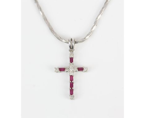 Ruby and diamond cross pendant, set with baguette cut emeralds, and round brilliant cut diamonds, all claw set in 18 ct, meas
