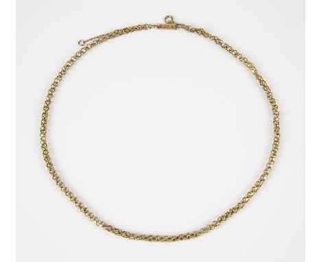 Fancy link necklace, with carved barrel clasp and safety chain, in gold stamped 15 ct, 45cm in length Condition Report:  Gros